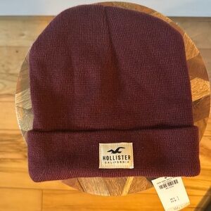 New with tags! Winter beanie from Hollister. One size fits all. Maroon.